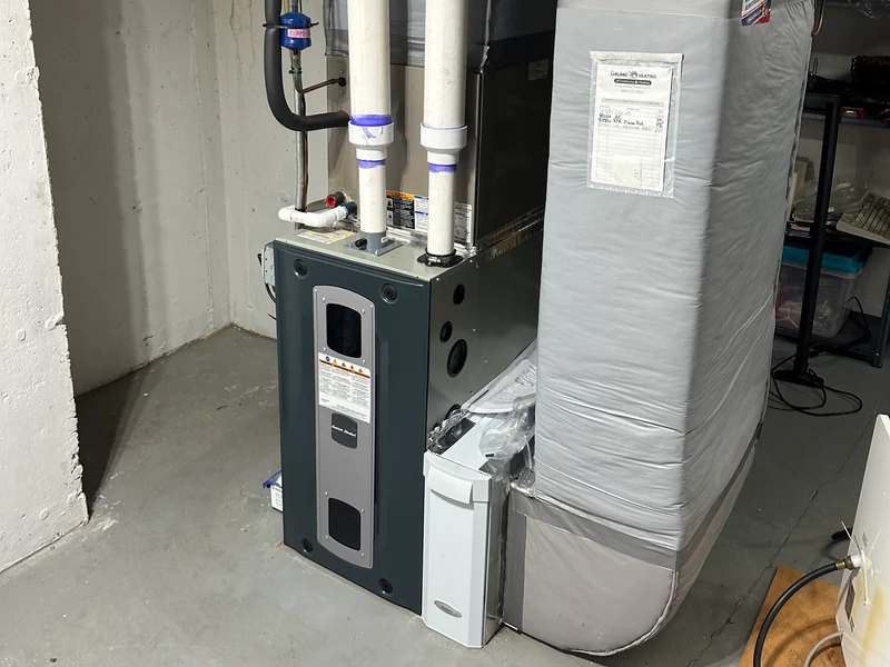 American Standard furnace with PVC venting and insulated ductwork