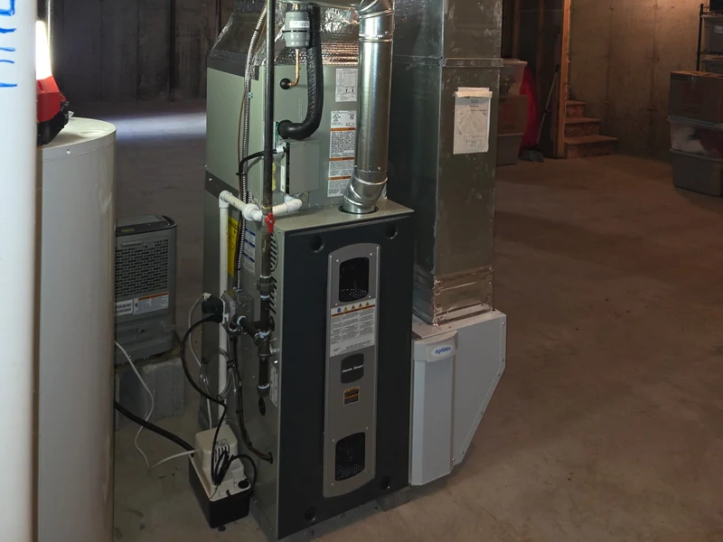 American Standard 80% AFUE gas furnace installation in a Southern NH basement