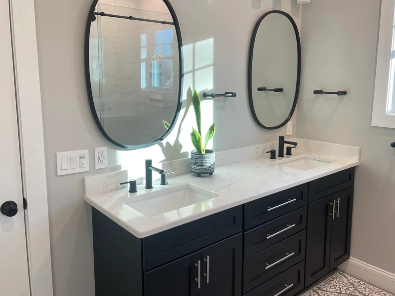 Bathroom double vanity installed by A.J. LeBlanc Heating in a Southern NH home