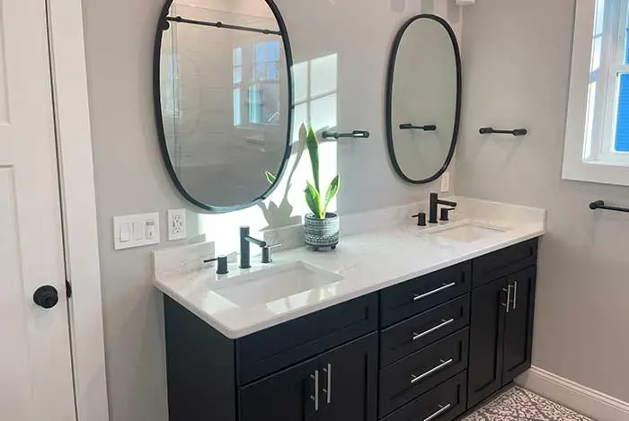 Bathroom double-vanity plumbing completed by A.J. LeBlanc Heating in a Southern NH home