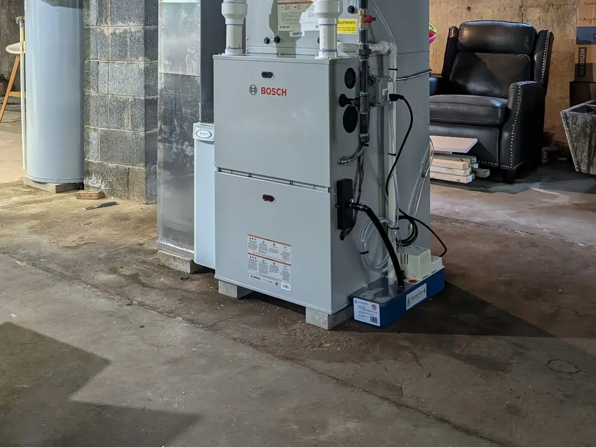 Bosch propane furnace installation serviced by A.J. LeBlanc Heating technicians in a Southern NH basement