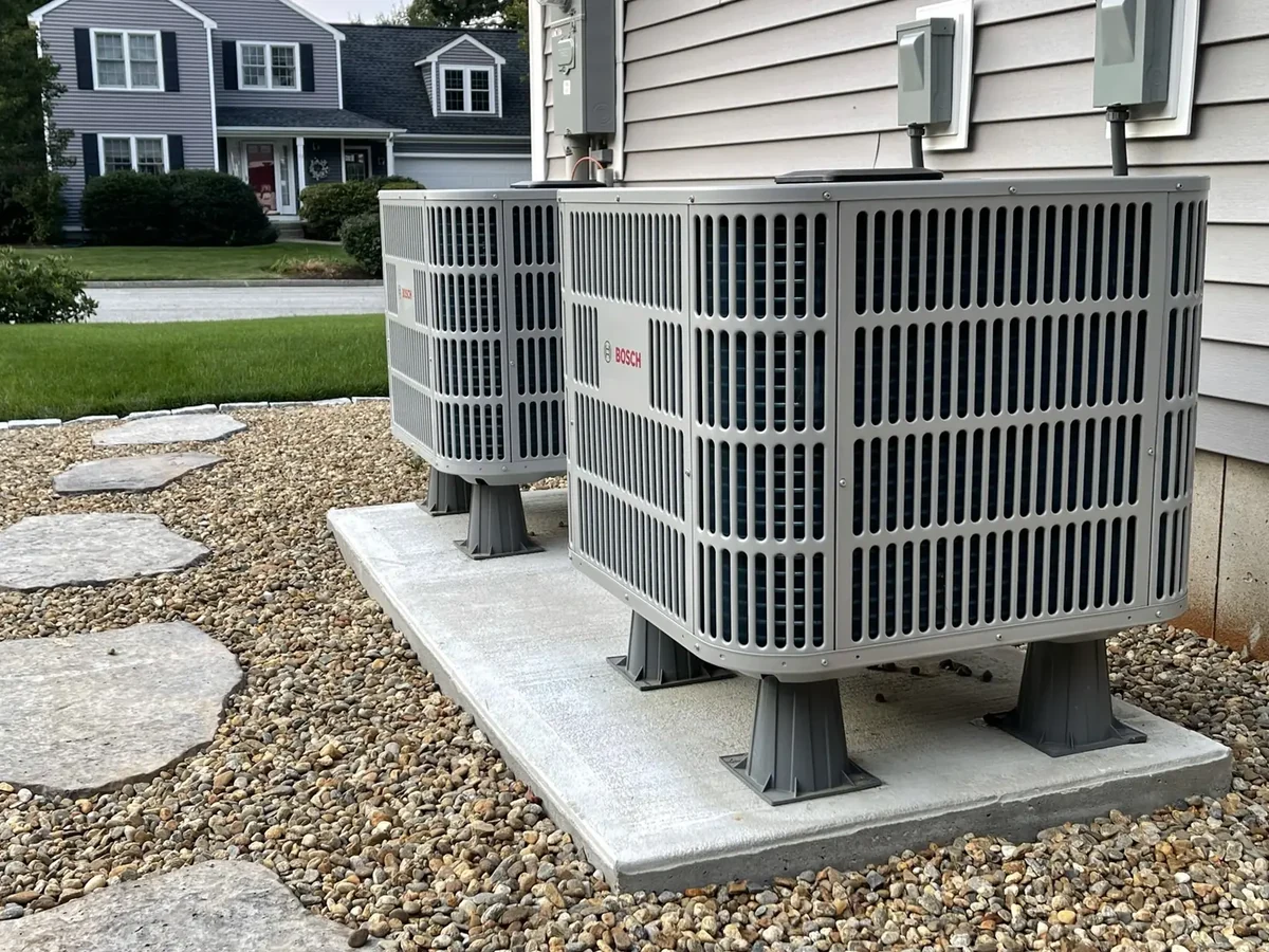 Bosch cold-climate heat pump installed outside a Southern NH home