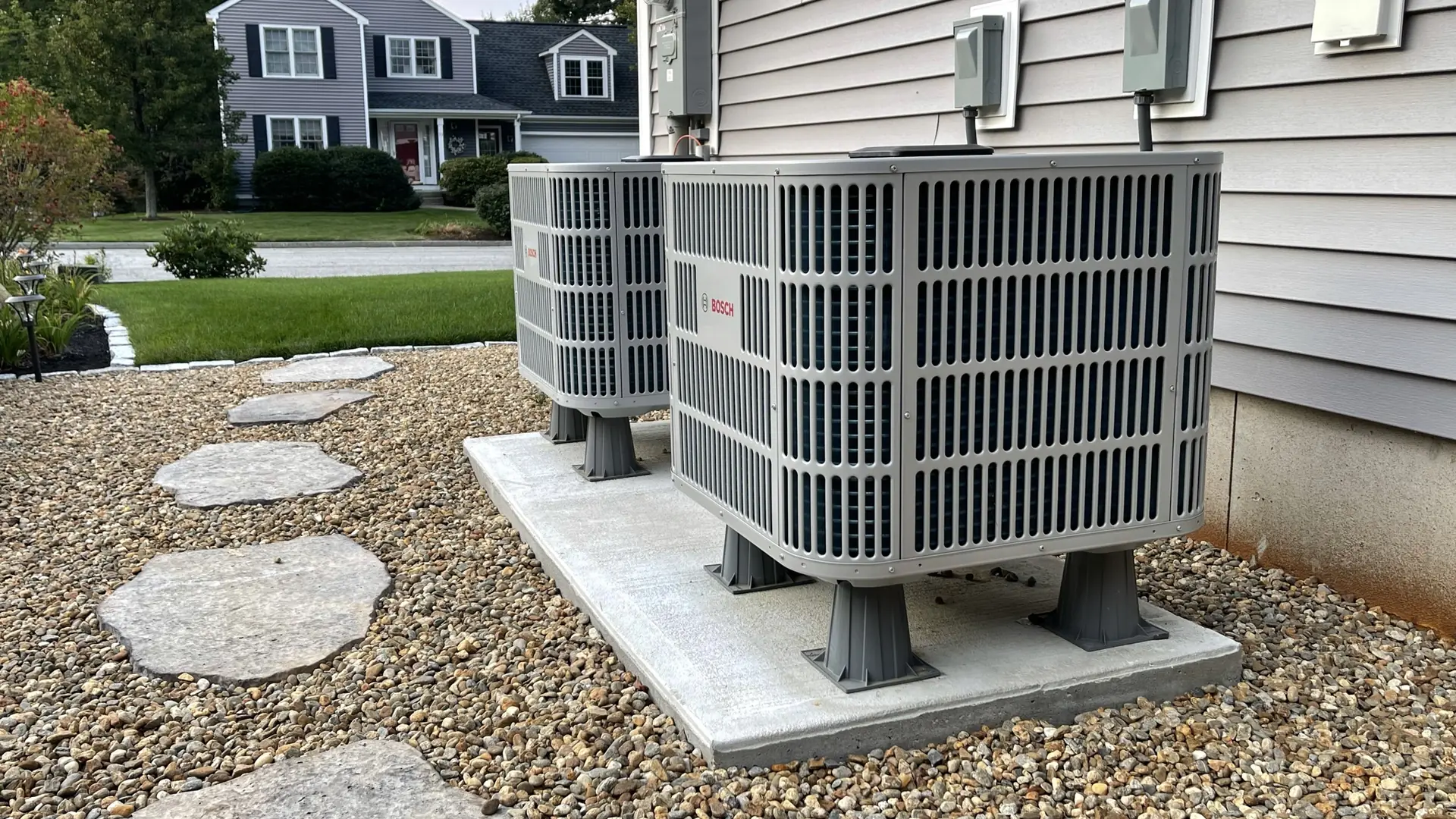 Bosch cold-climate heat pump installed outside a Southern NH home