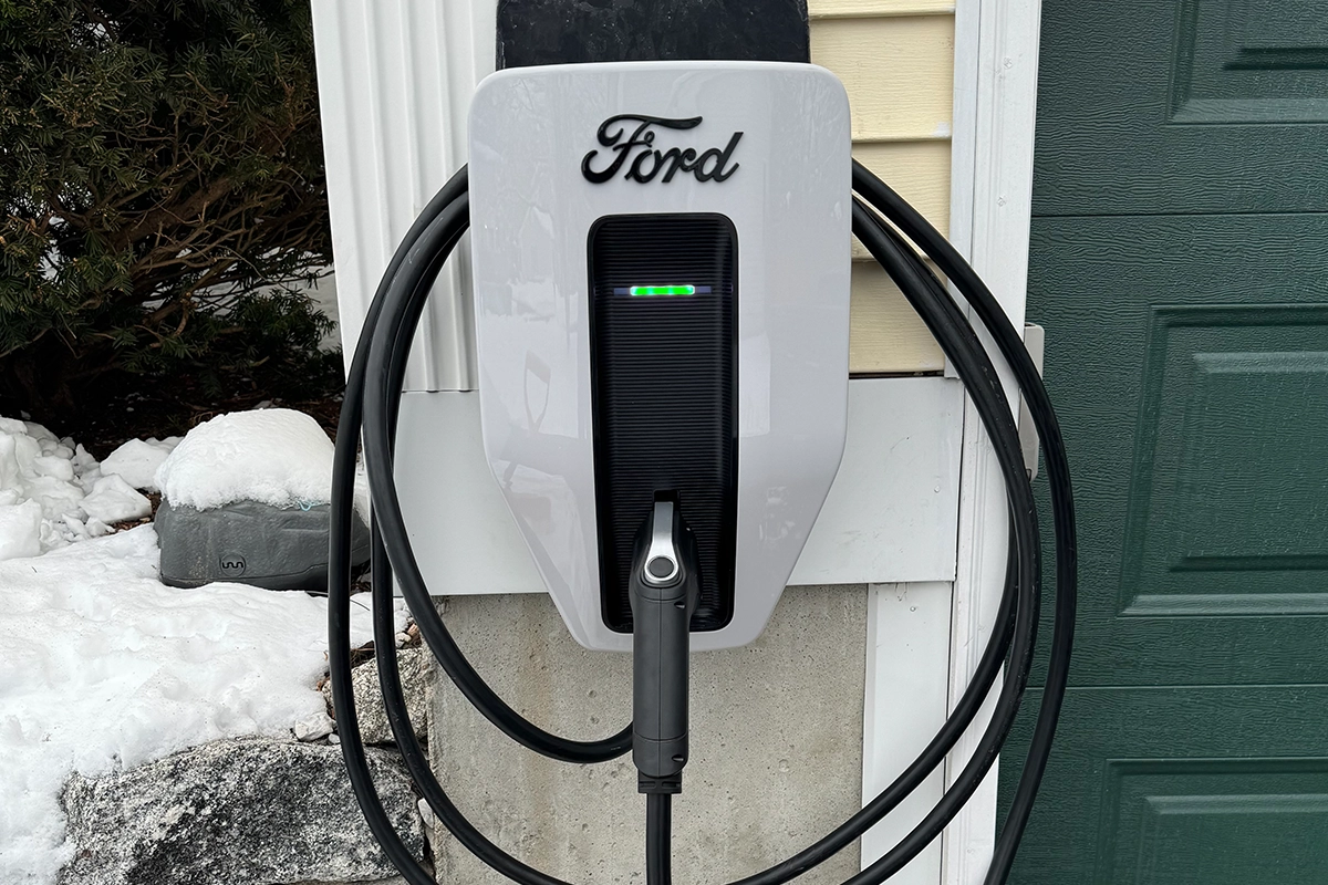 Wall-mounted Level 2 EV charger installation in Southern New Hampshire