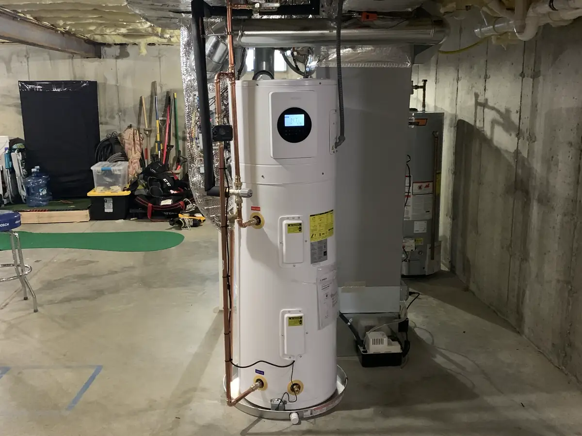 Hybrid heat pump water heater installed in a New Hampshire home, an efficient alternative to a tankless unit
