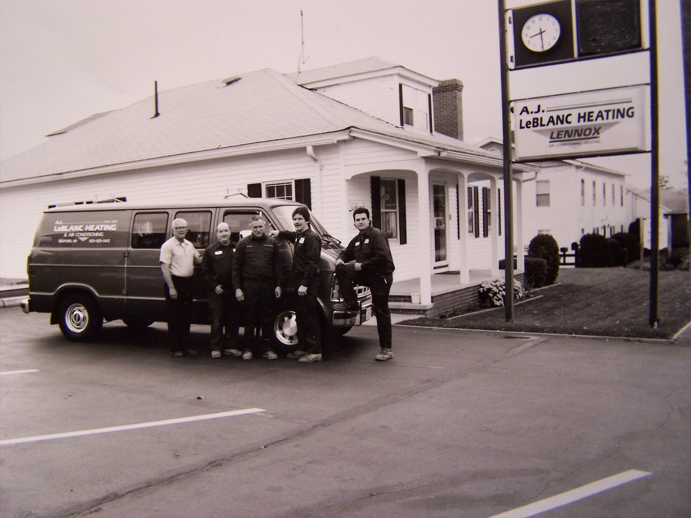 Historic A.J. LeBlanc Heating technicians with service van