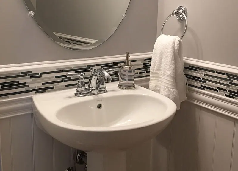 Pedestal sink installed by NH licensed plumbers