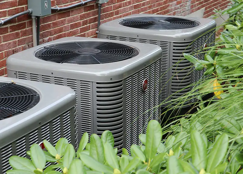 3 Rheem central air conditioners installed in a residential home